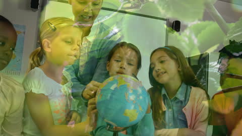 Teacher and Children Exploring Globe
