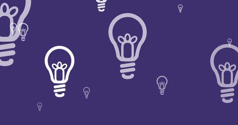 Creative Light Bulb Concept with Purple Background