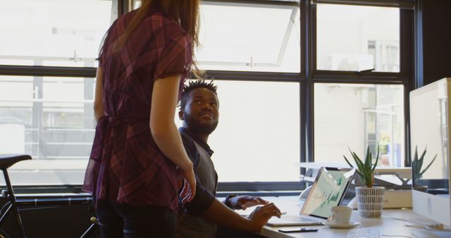 Two Professionals Collaborating in Modern Office Environment - Download Free Stock Images Pikwizard.com