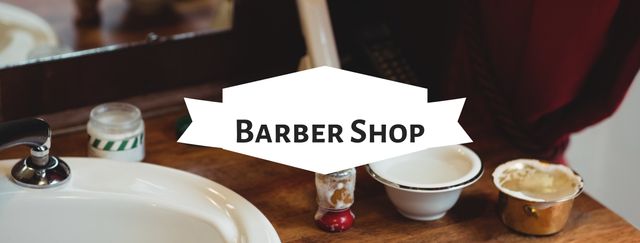 Classic barber shop scene with a wooden counter, sink, and various grooming tools. Appealing for advertisements focused on men's grooming products or services. Suitable for use in marketing materials for traditional barber shops, men’s skincare products, or lifestyle magazines.