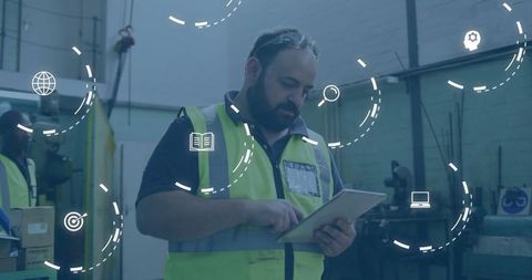 Warehouse Worker Using Tablet with Digital Interface Icons Overlaid