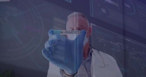 Doctor with covid-19 vaccine in technological laboratory