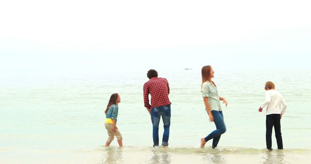 Family looking at the beach together