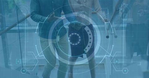 Business professionals walking up glass staircase with tablet and futuristic hud overlay