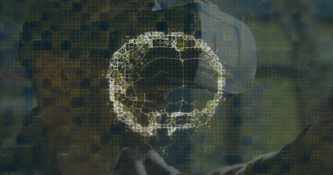 Vr headset with spinning digital brain hologram