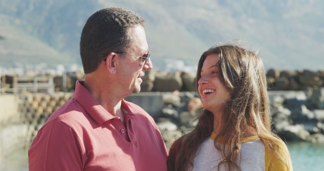 Happy Father and Teenage Daughter Enjoying Coastal View - Download Free Stock Images Pikwizard.com