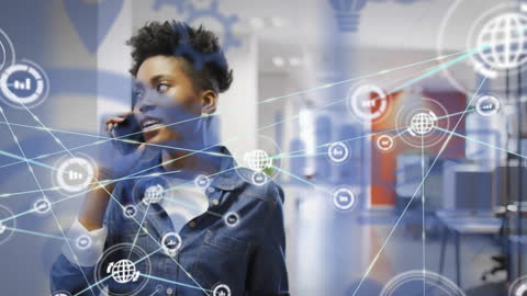 African American Businesswoman Connected Globally in Tech Office