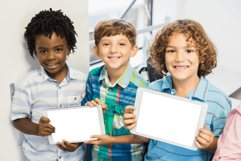 Joyful Children Holding Transparent Tablets in Classroom - Download Free Stock Videos Pikwizard.com