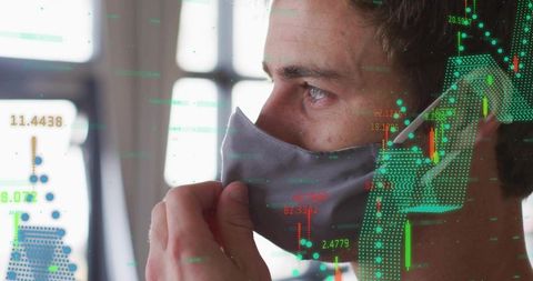 Business Analyst Adjusting Mask While Analyzing Digital Data