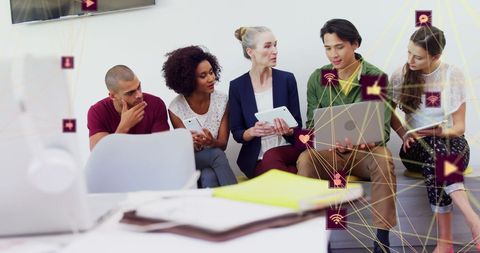 diverse team engaging in technology-driven collaboration - Download Free Stock Images Pikwizard.com