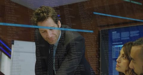 Business Team Collaborating with Digital Interfaces in Modern Conference Room