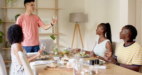 Friends Enjoying Casual Lunch Gathering at Home Together