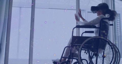 Woman in wheelchair experiencing virtual reality