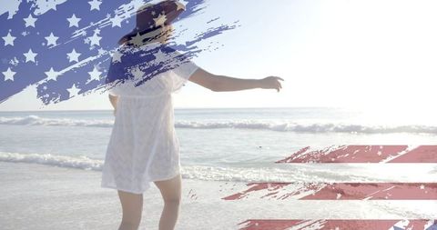 Young Woman with USA Flag Overlay on Beach, Symbolizing American Freedom