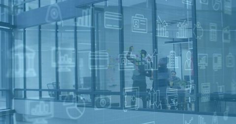 Business Icons Over Colleagues Discussing Work at Modern Office