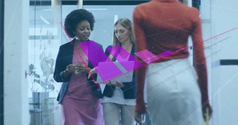 Dynamic women collaborating in modern office space