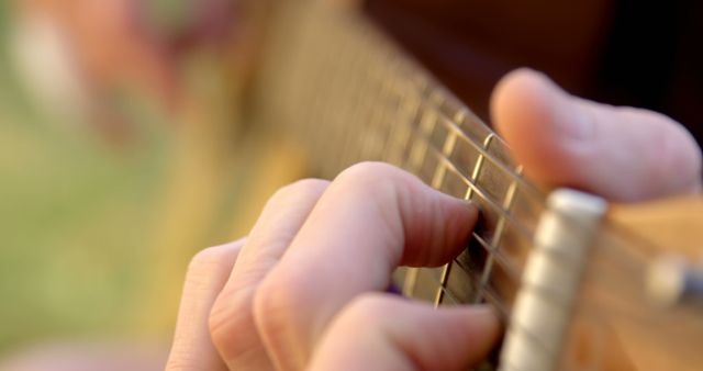 Close-up of Hands Playing Acoustic Guitar Strings - Download Free Stock Images Pikwizard.com