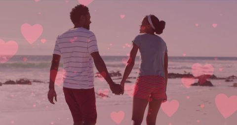 Romantic Beach Walk with Overlay of Pink Hearts - Download Free Stock Images Pikwizard.com