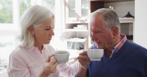 Happy Senior Couple Enjoying Tea Together