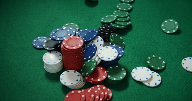 Close-up of casino chips on poker table in casino
