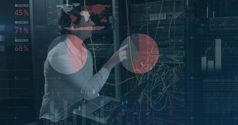 IT technician inspecting server rack with network analytics overlay in datacenter