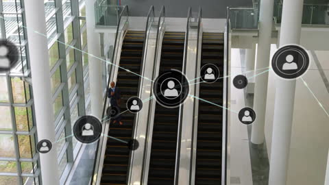 Innovative Network Icons Surrounding Businessman on Escalator