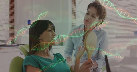 Dentist Consulting Patient with DNA Strand Overlay