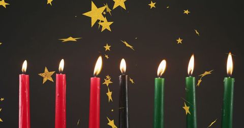 Kwanzaa Celebration with Seven Lit Candles and Golden Stars - Download Free Stock Images Pikwizard.com