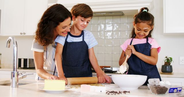 Mother Baking with Children in Modern Kitchen - Download Free Stock Images Pikwizard.com