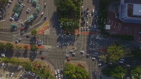 Mathematical Equations Floating Over City Intersection Aerial View