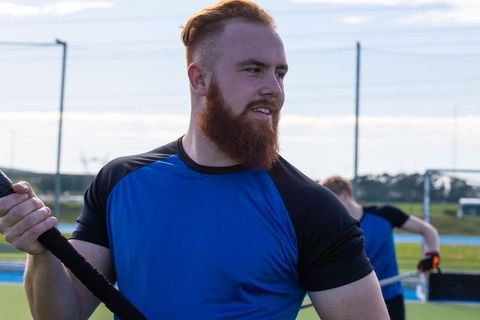 Energetic team athletes engaged in intense outdoor workout