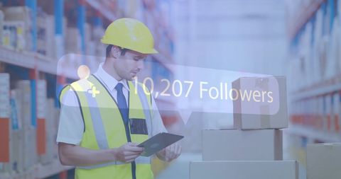 Warehouse Manager Utilizing Tablet Technology with Follower Statistic Overlay - Download Free Stock Images Pikwizard.com
