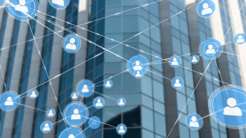 Digital Network of Profile Icons Overlaying Skyscrapers