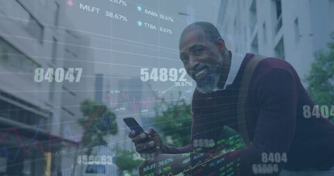 African American Man Engaged with Business Data on Smartphone Outdoors - Download Free Stock Images Pikwizard.com