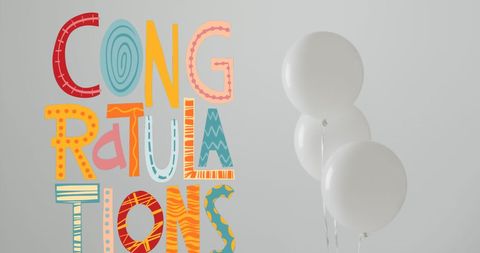Whimsical congratulations with white balloons celebration art