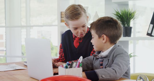 Young Boys Collaborating on Laptop at Home - Download Free Stock Images Pikwizard.com