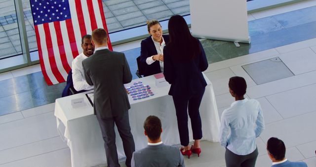 Candidates Registering for Election with Election Officials at Registration Table - Download Free Stock Images Pikwizard.com