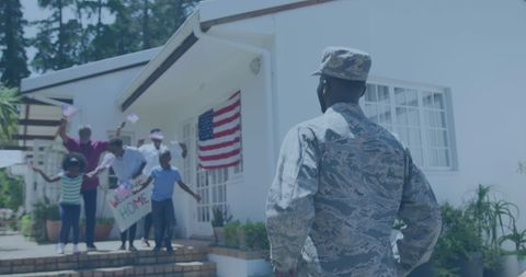 American Family Welcoming Soldier Home with Patriotic Cheers