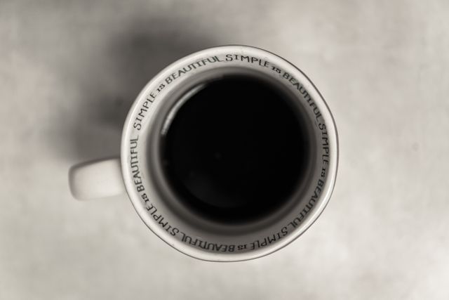 White and Black Ceramic Mug With Coffee - Download Free Stock Photos Pikwizard.com