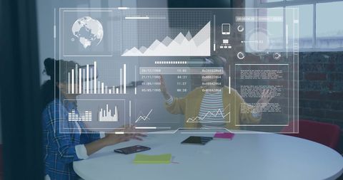 Biracial businesswoman using vr headset for data analysis