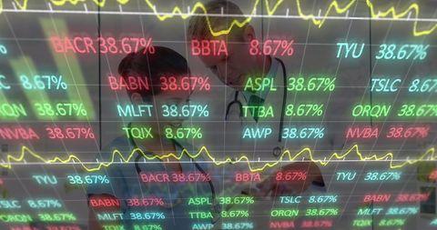 Doctors Discussing with Stock Market Data Overlay