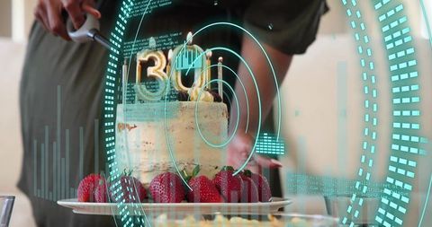 Olive-skinned woman presenting frosted birthday cake with strawberries and holographic hud