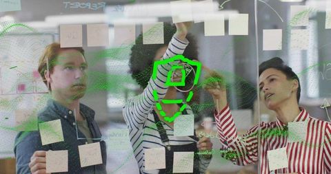 Colleagues Brainstorming with Digital Overlay on Transparent Board