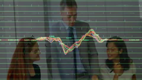 Business Professionals Discussing Financial Data with Graph Overlay