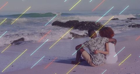 Happy Multiracial Couple Sitting on Beach with Ocean Waves and Pastel Accents