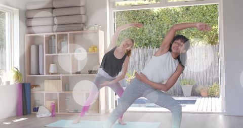 Diverse Teenage Girls Practicing Yoga in Sunny Studio