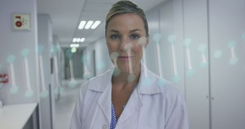 Innovative female doctor and dna concept overlay