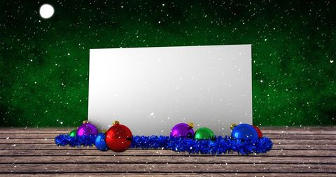 Christmas card with ornaments and snowflakes