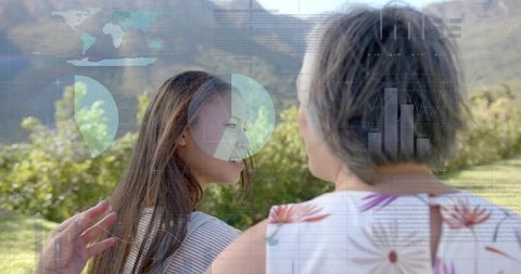 Mother chatting with teen in sunny meadow with digital analytics overlay for wellness tech