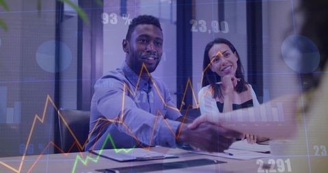 Professionals Collaborating in Modern Office with Data Analytics Overlay